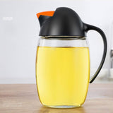 Olive Oil Dispenser 21oz Glass Oil Dispenser Bottle With Automatic Flip Cap Drip Free Oil and Vinegar Cruet for Kitchen Penguin Design